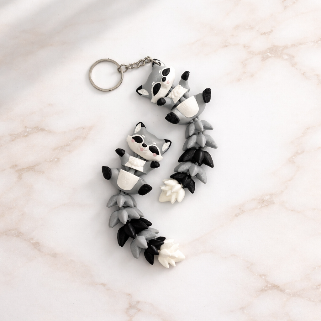Schlüsselanhänger / Magnet / Ruhestifter "Schlabbi" - Waschbär